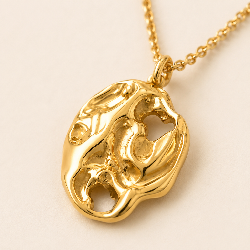 Close-up of a hammered natural-look gold pendant
