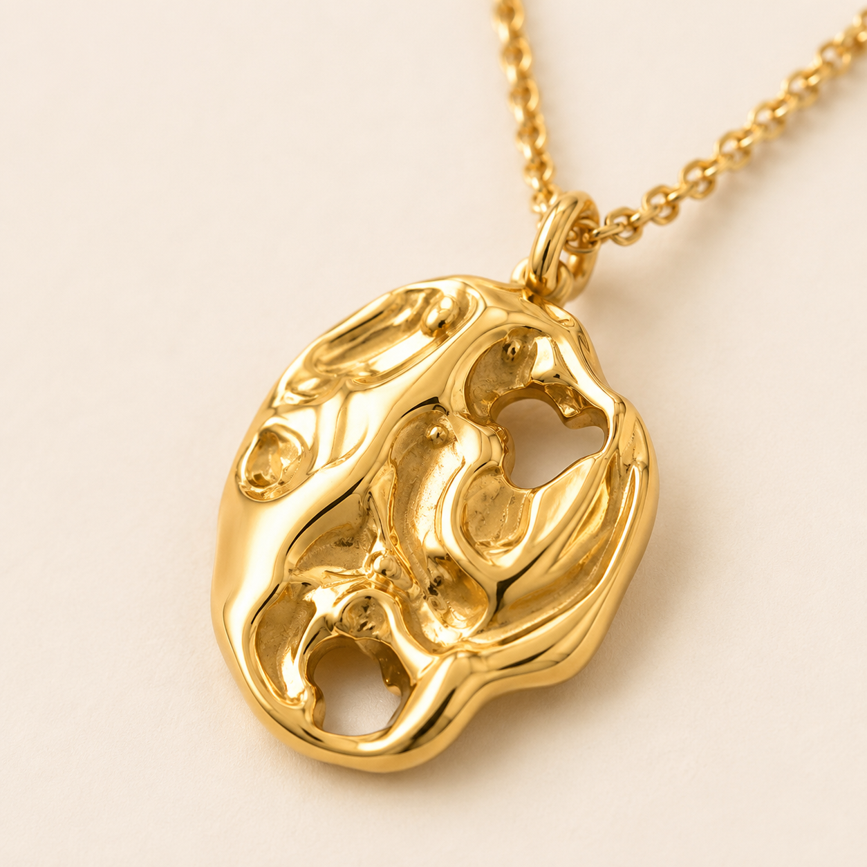 Close-up of a hammered natural-look gold pendant