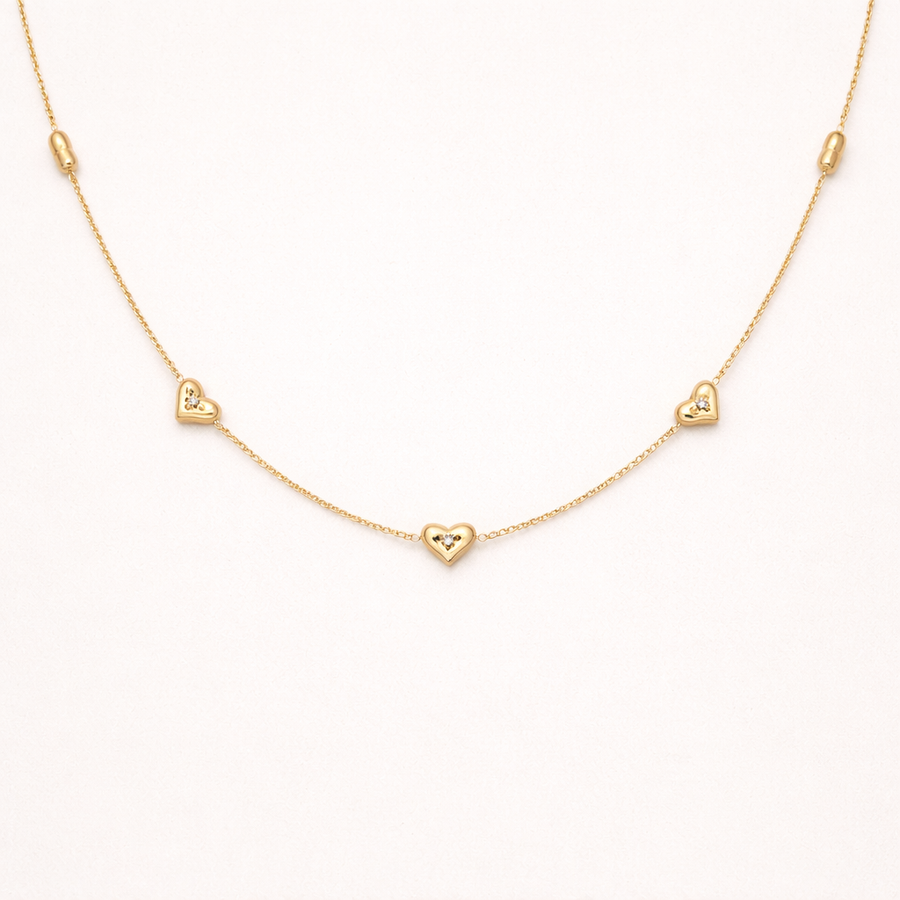 Amora gold necklace with small hearts design
